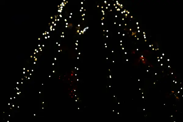 Árvore de Natal luzes no escuro — Fotografia de Stock