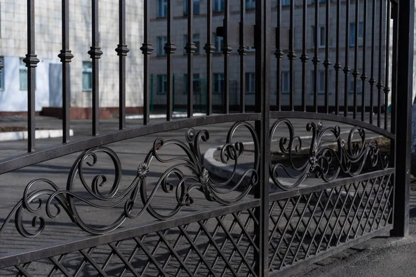 Metal black gate with arment