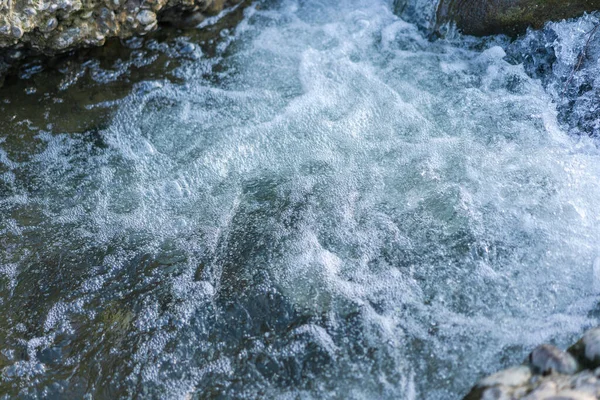 River stream with air bubbles