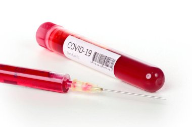 Syringe with red medical injection vaccine. Isolated on white background. COVID 19 nCov outbreak concept. clipart
