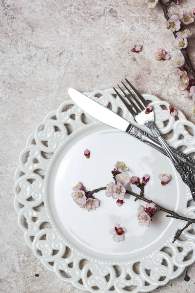 Beautiful Festive Table Setting Spring Blossoming Branches Light Textured Background — Stock Photo, Image