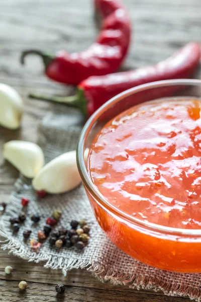 Glass bowl of thai sweet chili sauce — Stock Photo, Image