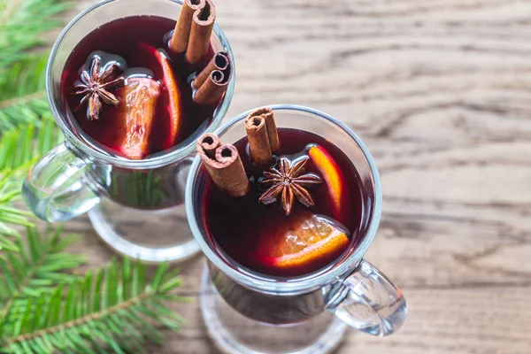 Two glasses of mulled wine with fir branch — Stock Photo, Image