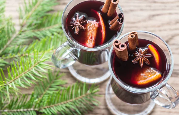 Two glasses of mulled wine with fir branch — Stock Photo, Image