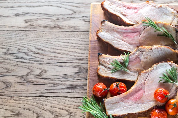 Grilled pork ribs on the wooden board — Stock Photo, Image