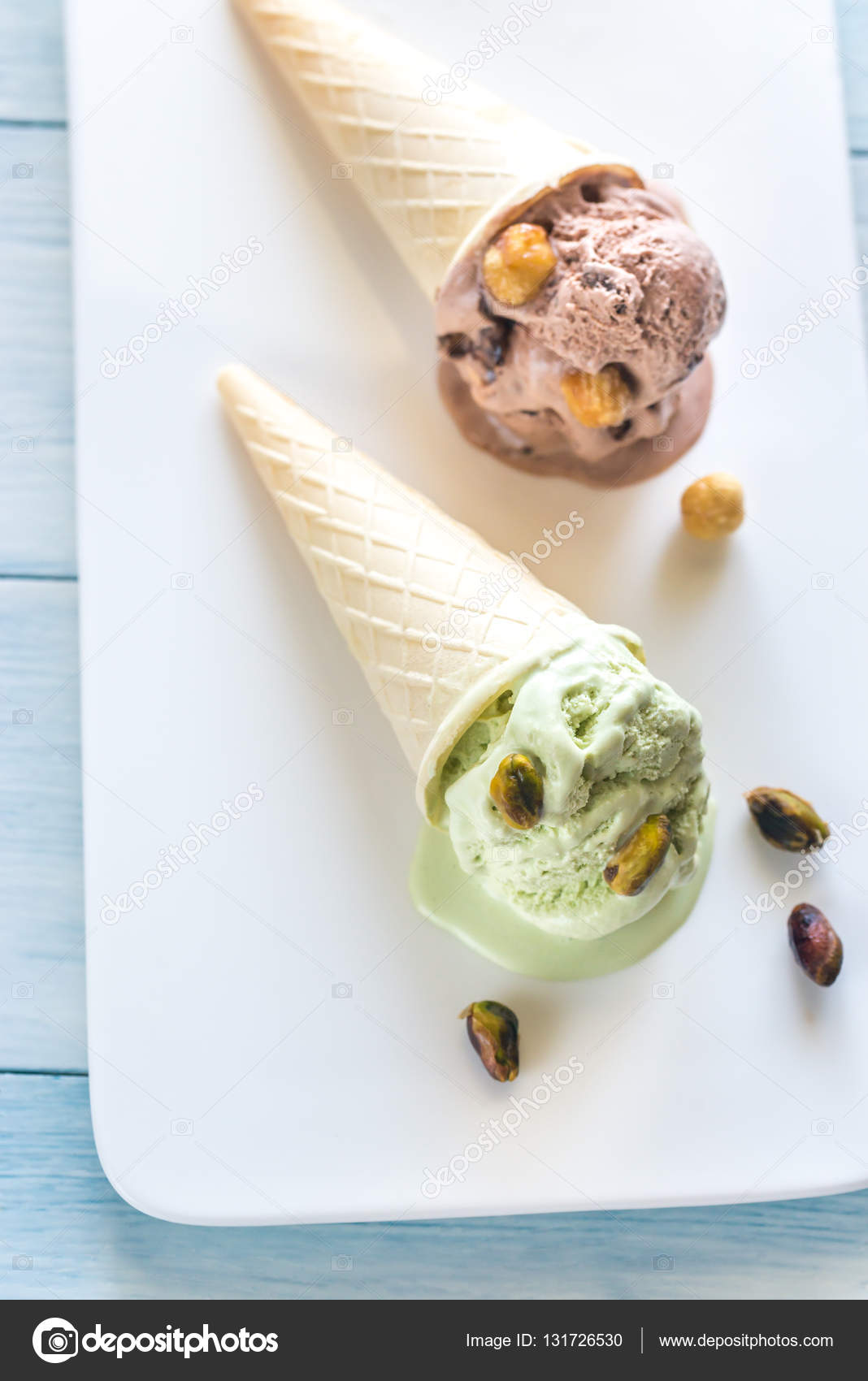 Two cones of nutflavored ice cream Stock Photo by ©alex9500 131726530