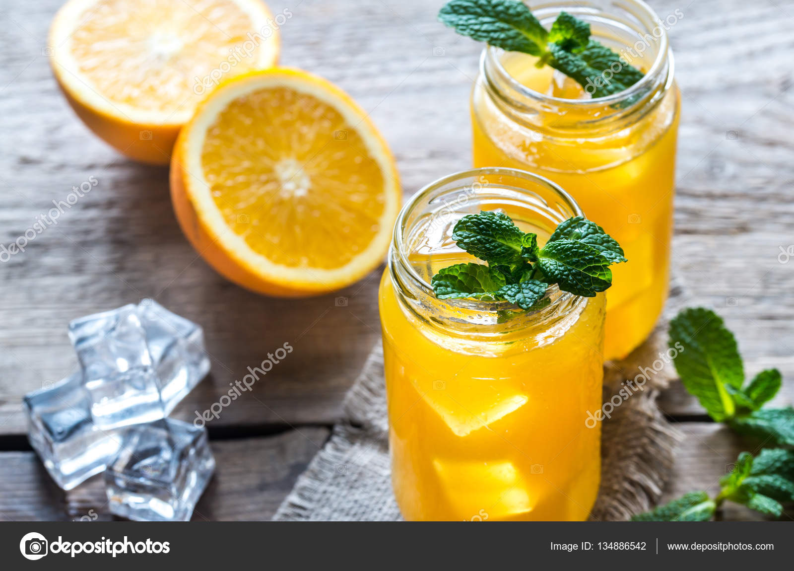 Glass jars of orange juice — Stock Photo © alex9500 134886542