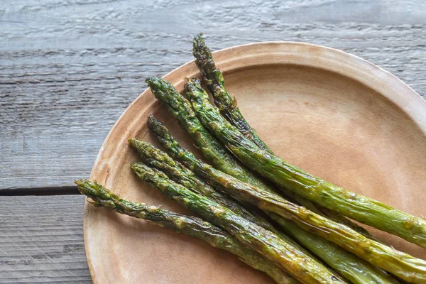 Roasted asparagus on the plate — Stock Photo, Image
