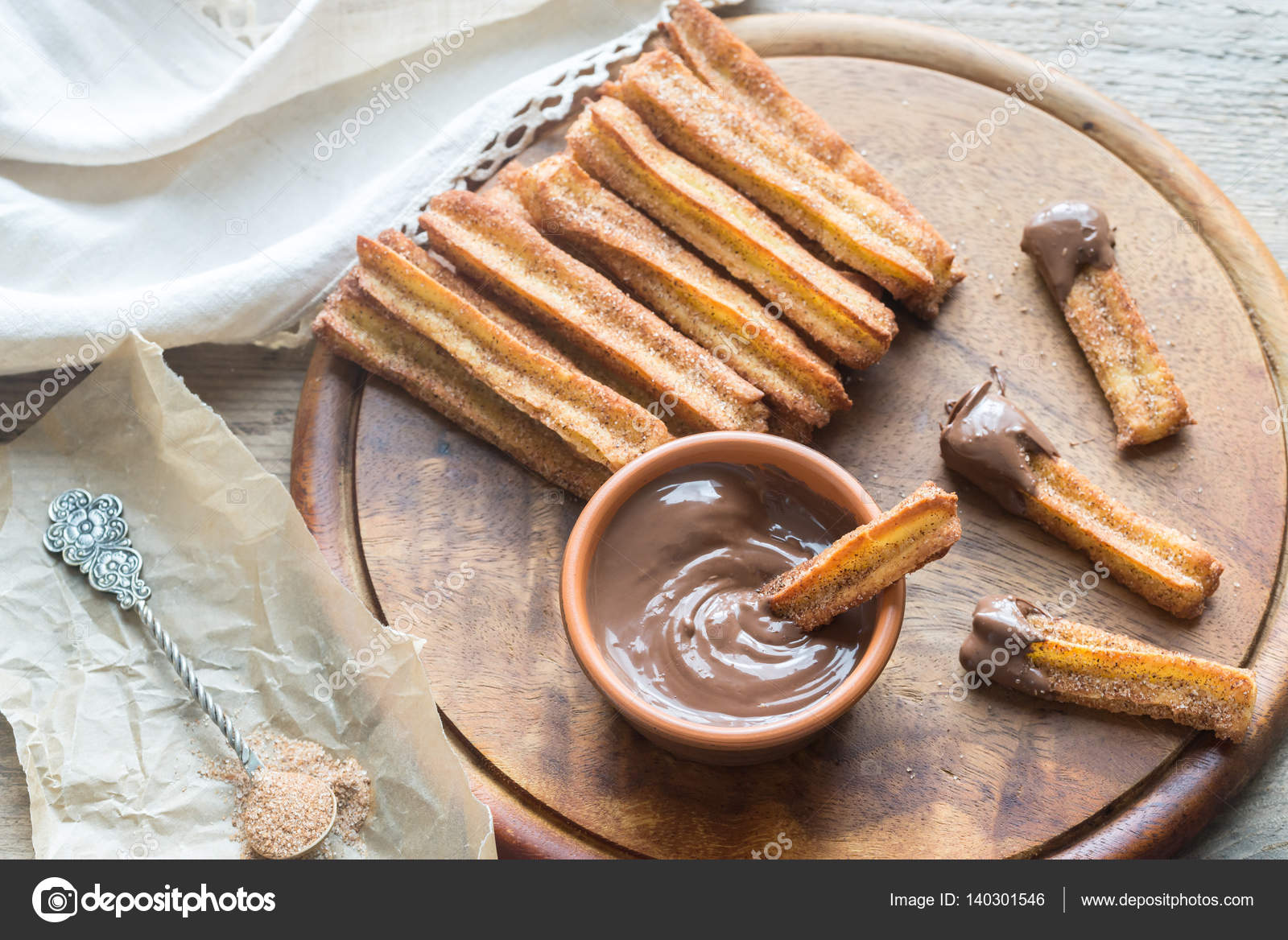 Churros Famous Spanish Dessert With Chocolate Sauce Stock Photo churros-famous-spanish-dessert-with-chocolate-sauce-stock-photo