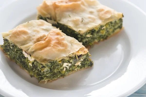 Portion of Spanakopita - Greek spinach pie — Stock Photo, Image