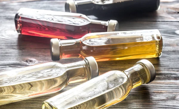 Bottles with different kinds of vinegar — Stock Photo, Image