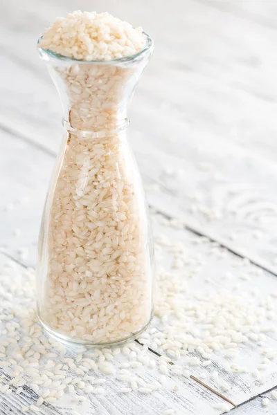 Arborio pirinç şişe — Stok fotoğraf
