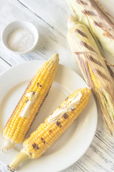 Grilled corncorbs on the plate — Stock Photo, Image