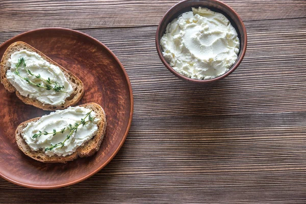 Toasts with cream cheese — Stock Photo, Image