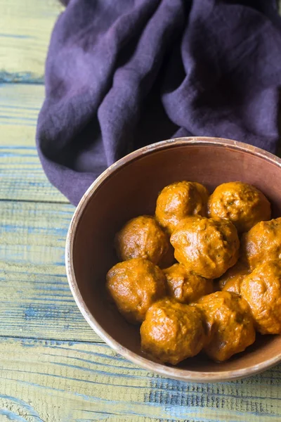 Bowl of turkey meatballs with curry sauce — Stock Photo, Image