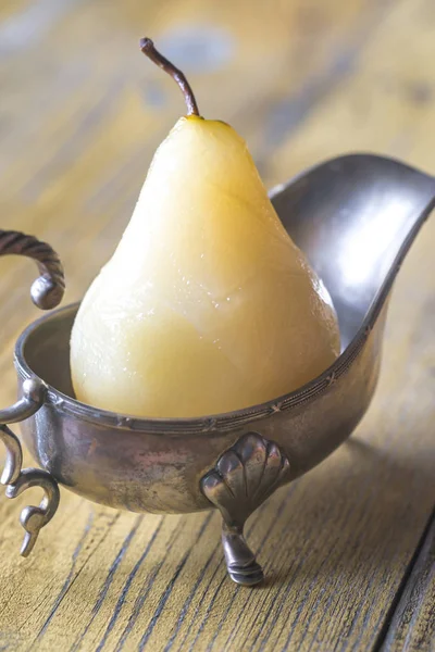 Poached pear in the gravy boat — Stock Photo, Image