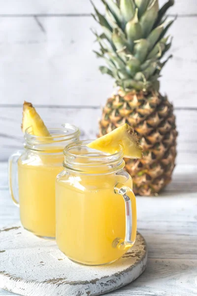 Two glasses of pineapple juice — Stock Photo, Image