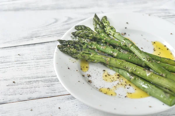 Cooked asparagus on the plate — Stock Photo, Image