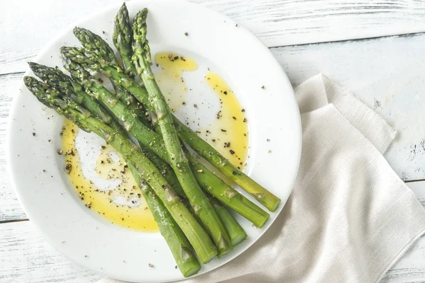 Cooked asparagus on the plate — Stock Photo, Image