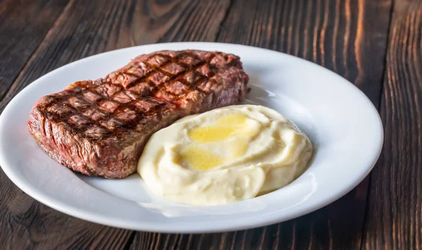 Strip steak with celery puree — Stock Photo, Image