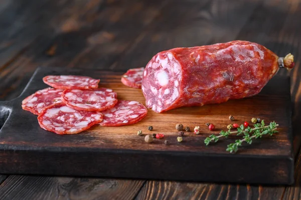 Italian salami with fresh thyme — Stock Photo, Image