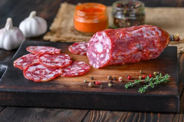 Italian salami with fresh thyme — Stock Photo, Image