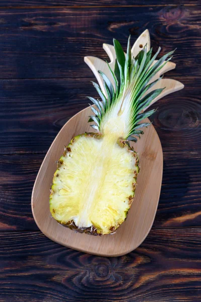 Pineapple on the wooden board — Stock Photo, Image