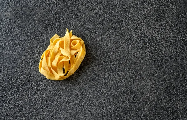 Raw pappardelle pasta — Stock Photo, Image