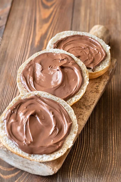 Slices Bread Chocolate Paste Wooden Board — Stock Photo, Image