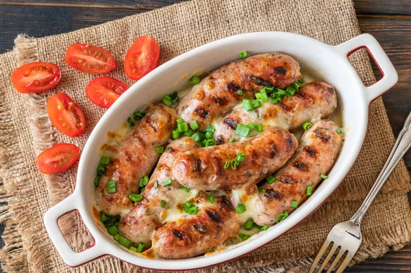 Baked Sausages Topped Cheese Green Onions — Stock Photo, Image