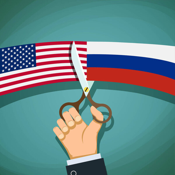 USA and Russian flags cutted with scissors