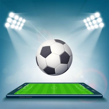 Futbol sahasında smartphone ekran.