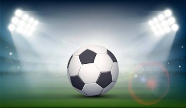 Futbol topu alan stadyum üzerinde.