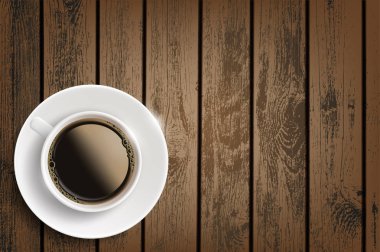 Tahta masada bir fincan kahve.