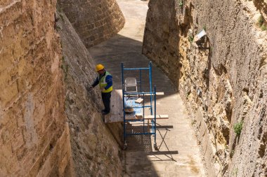 Mallorca, Spain - May 8, 2019: Old historical castle during renovation works