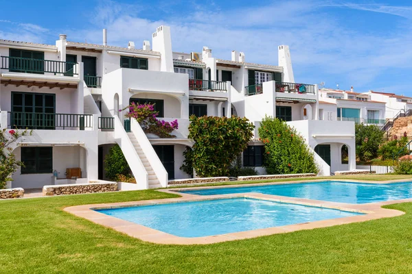 Minorca, Spain - October 12, 2019: Summer villas with swimming pool in the beautiful town of Fornells on Menorca