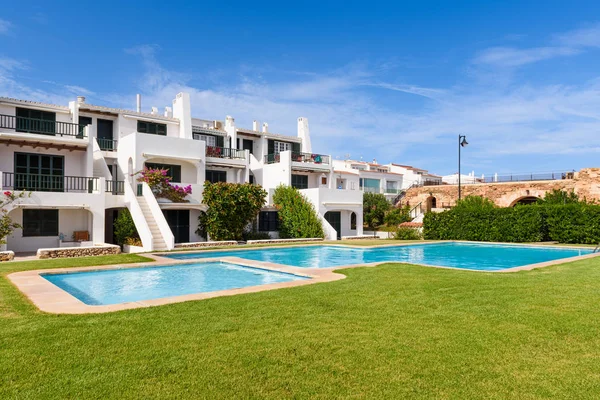Minorca, Spain - October 12, 2019: Summer villas with swimming pool in the beautiful town of Fornells on Menorca — 图库照片