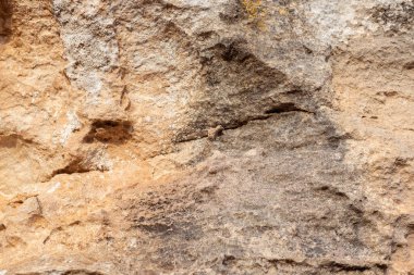 Doğal taştan arka plan. Kayaların yüzeyi, dokusu