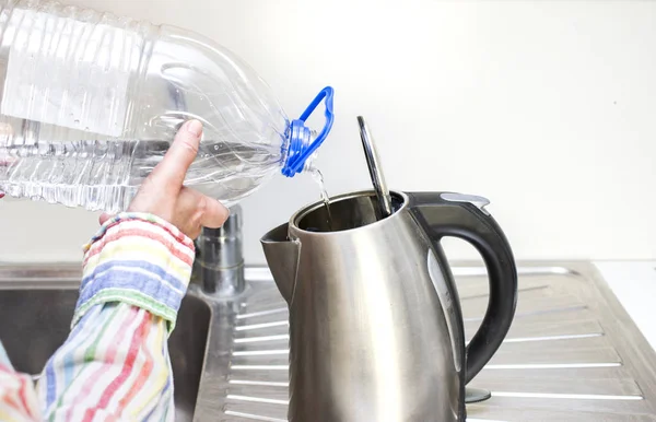 Pouring Water In Kettle — Stock Photo, Image