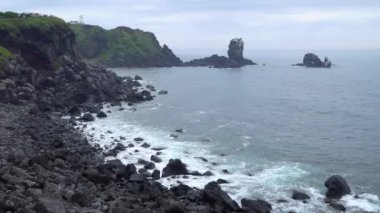 Jeju Adası, Kore pelerinle Seopjikoji