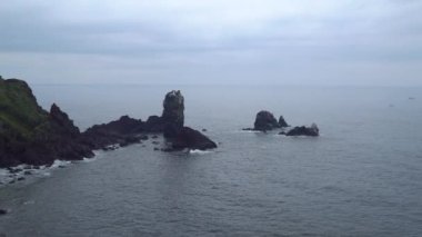 Jeju Adası, Kore pelerinle Seopjikoji