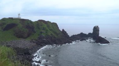 Jeju Adası, Kore pelerinle Seopjikoji