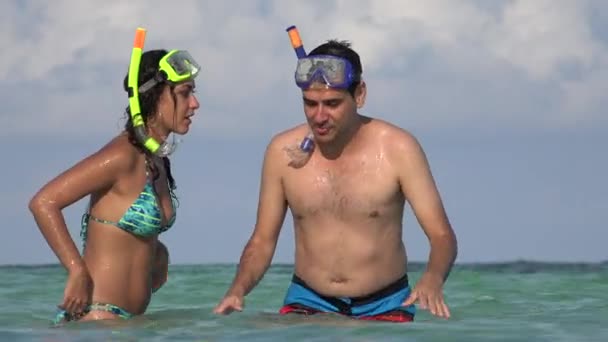 People having Fun In the Ocean Swimming With Snorkels — стоковое видео