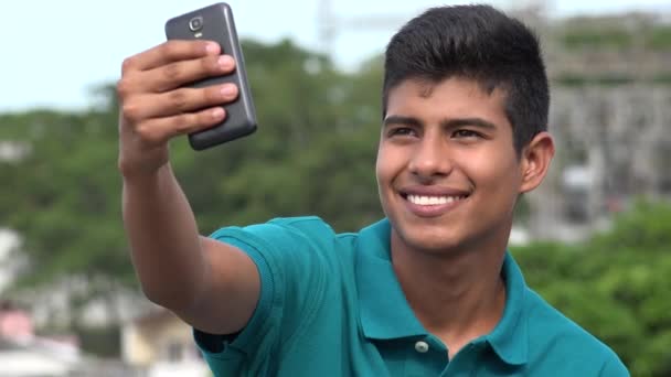 Smiling Teen Boy Taking Selfy — Stock Video