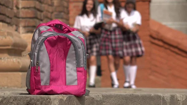 Female Students Walking Towards Backpack — Stock Photo, Image