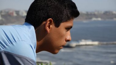 A Serious Teen Wondering