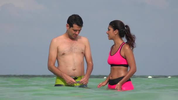 Man And Woman Swimmers In Ocean — Stock Video