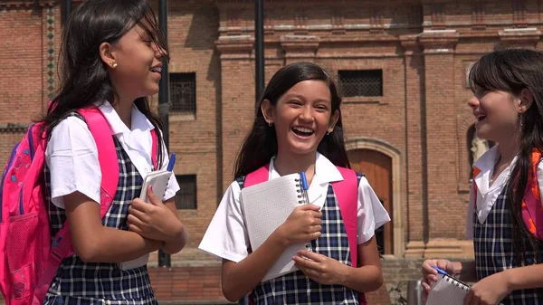 Students Socializing Wearing School Uniforms