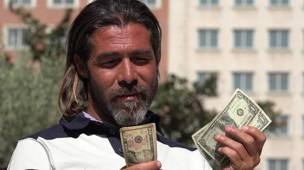 Homme comptant l'argent — Photo