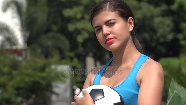 Feminino segurando bola de futebol — Vídeo de Stock